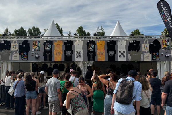 More fans outside queuing for Ed Sheeran merch.