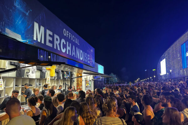 Audience just leaving the Ed Sheeran concert queuing for merch.